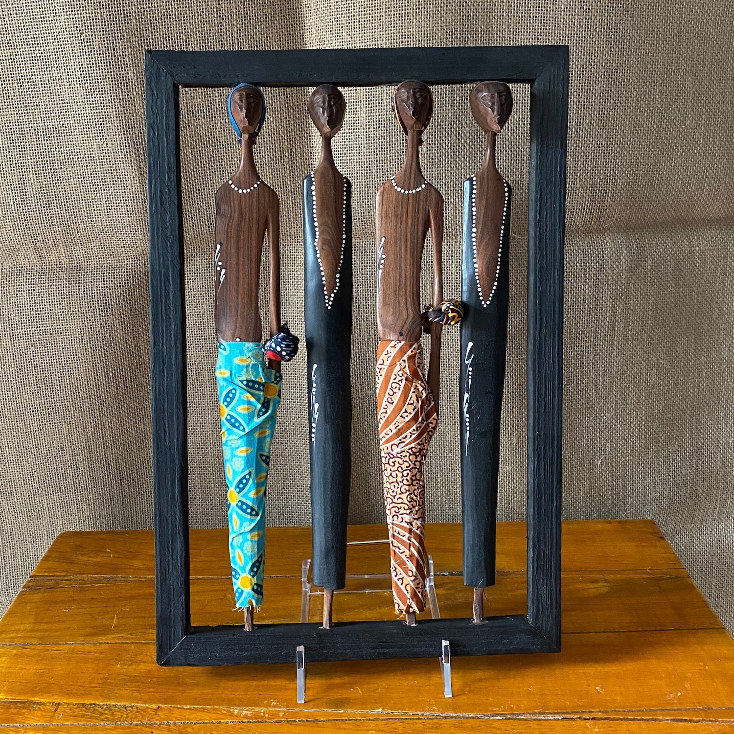 Frame with four figurines from Mozambique